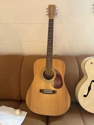 Item 2: Hohner natural dreadnought acoustic guitar