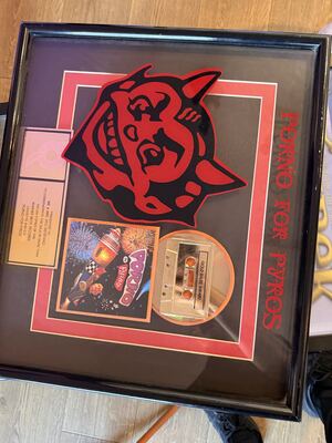 Item 11: framed Porno for Pyros gold sales award